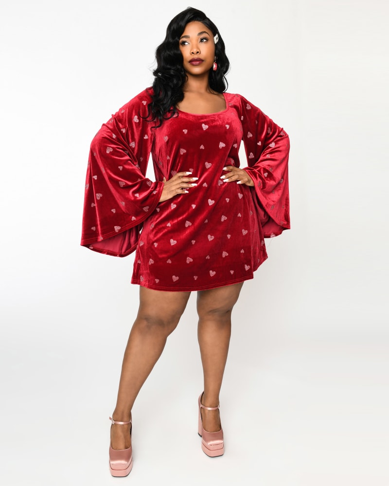 Front of a model wearing a size 2X Smak Parlour Plus Size Red Velvet & Pink Heart Downtown Scene Mini Dress in Red Velvet & Pink Heart by Smak Parlour. | dia_product_style_image_id:325066